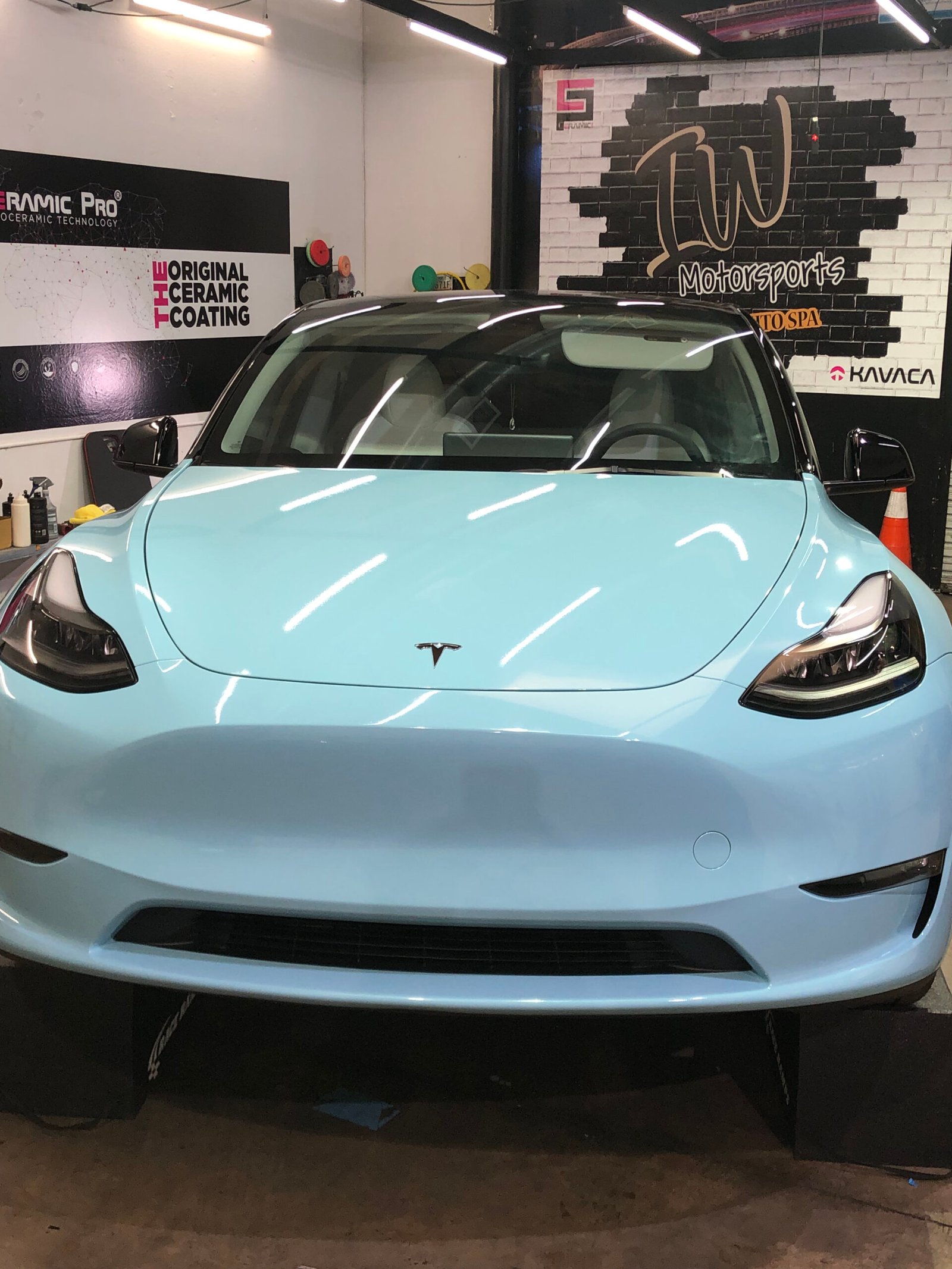 Professional window tint installation at IW Motorsports