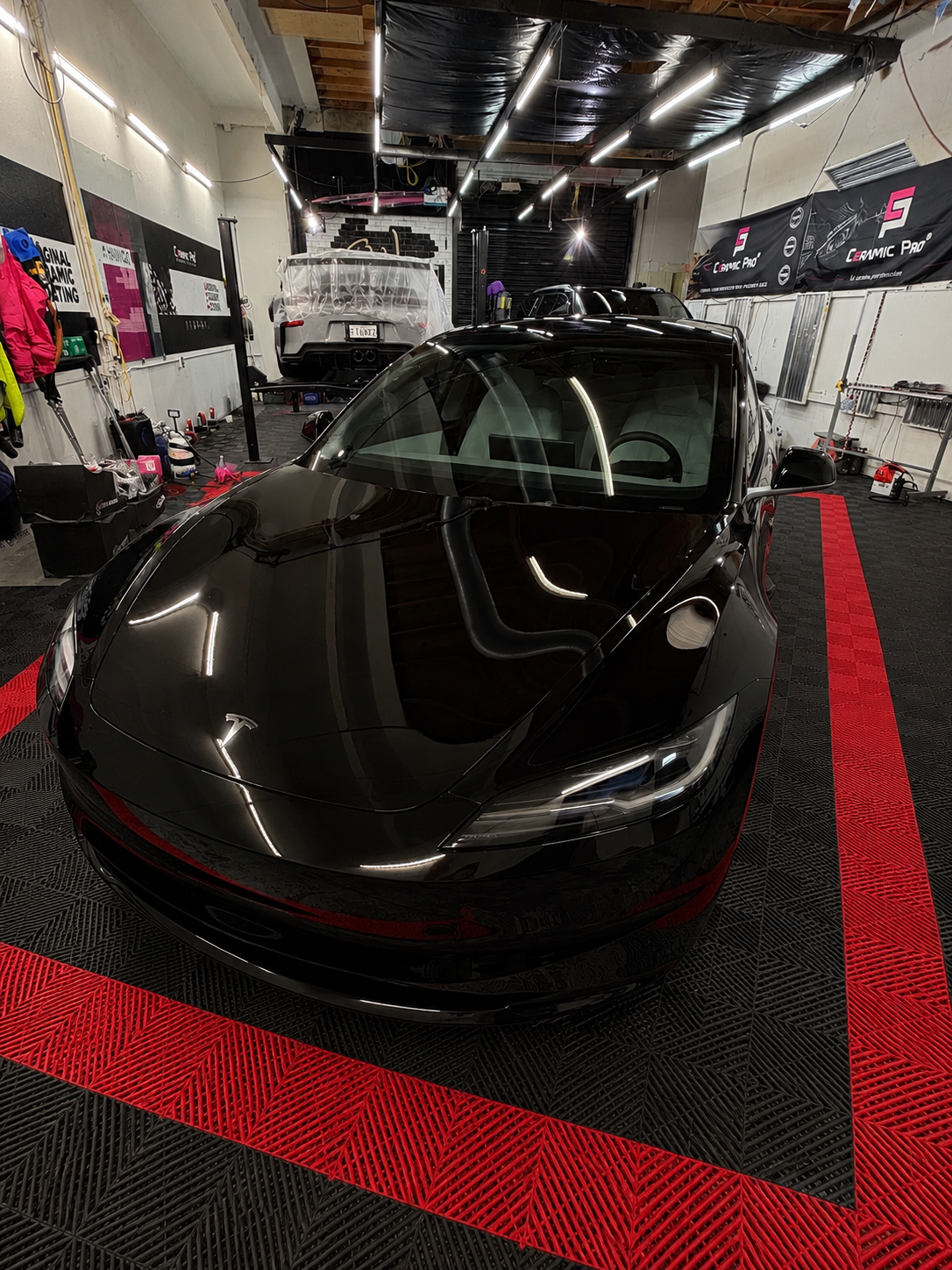 Black Tesla protected by IW Motorsports