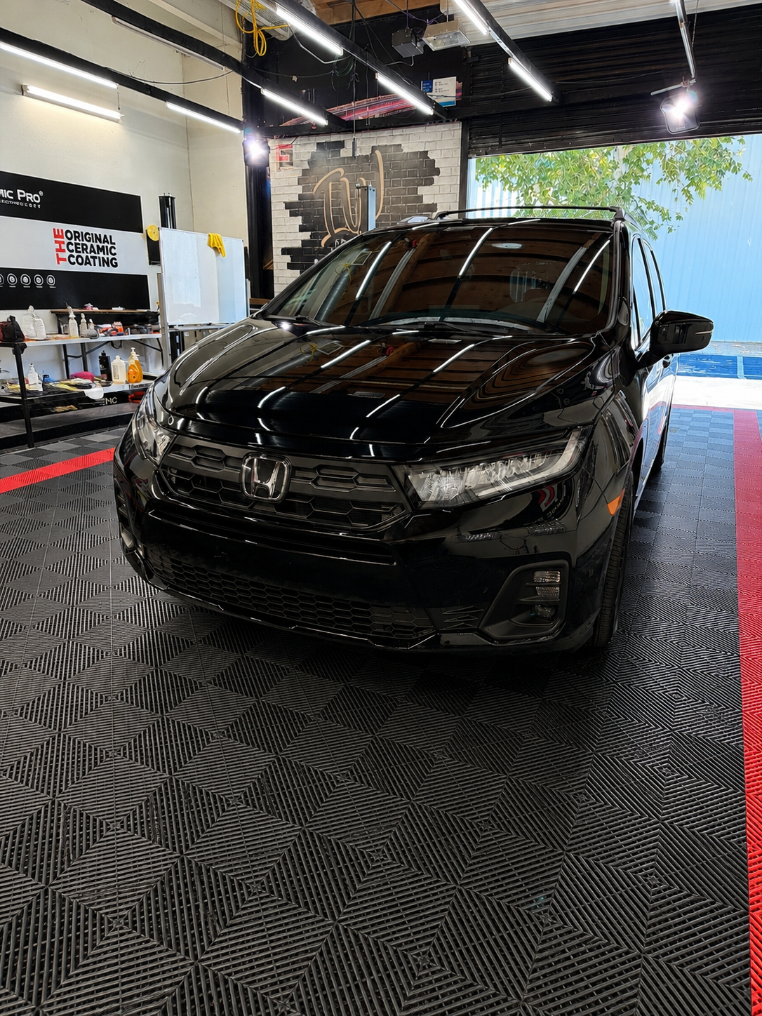 Family vehicle protected with clear and ceramic window film